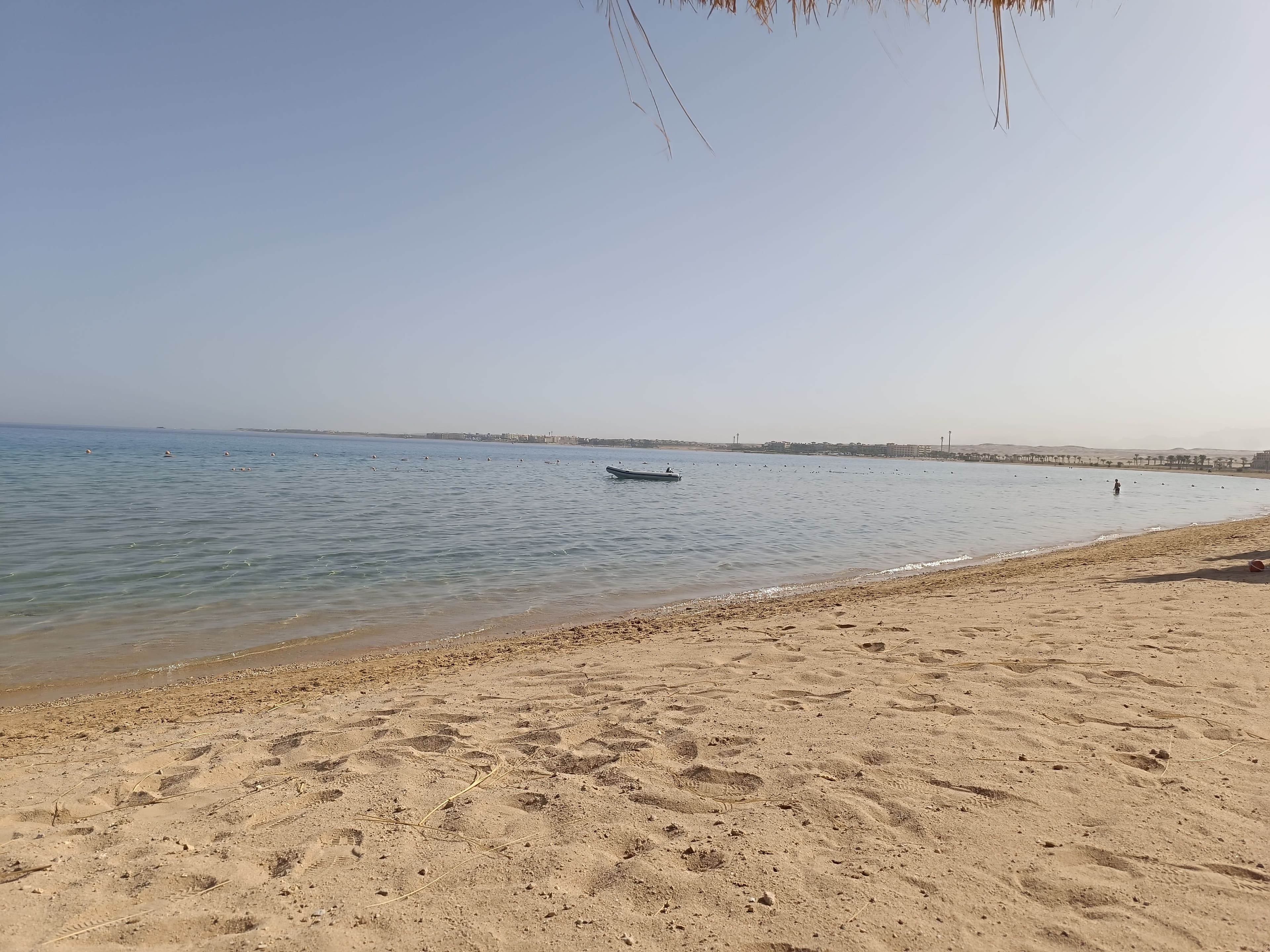 A private yacht at anchor over the reef.