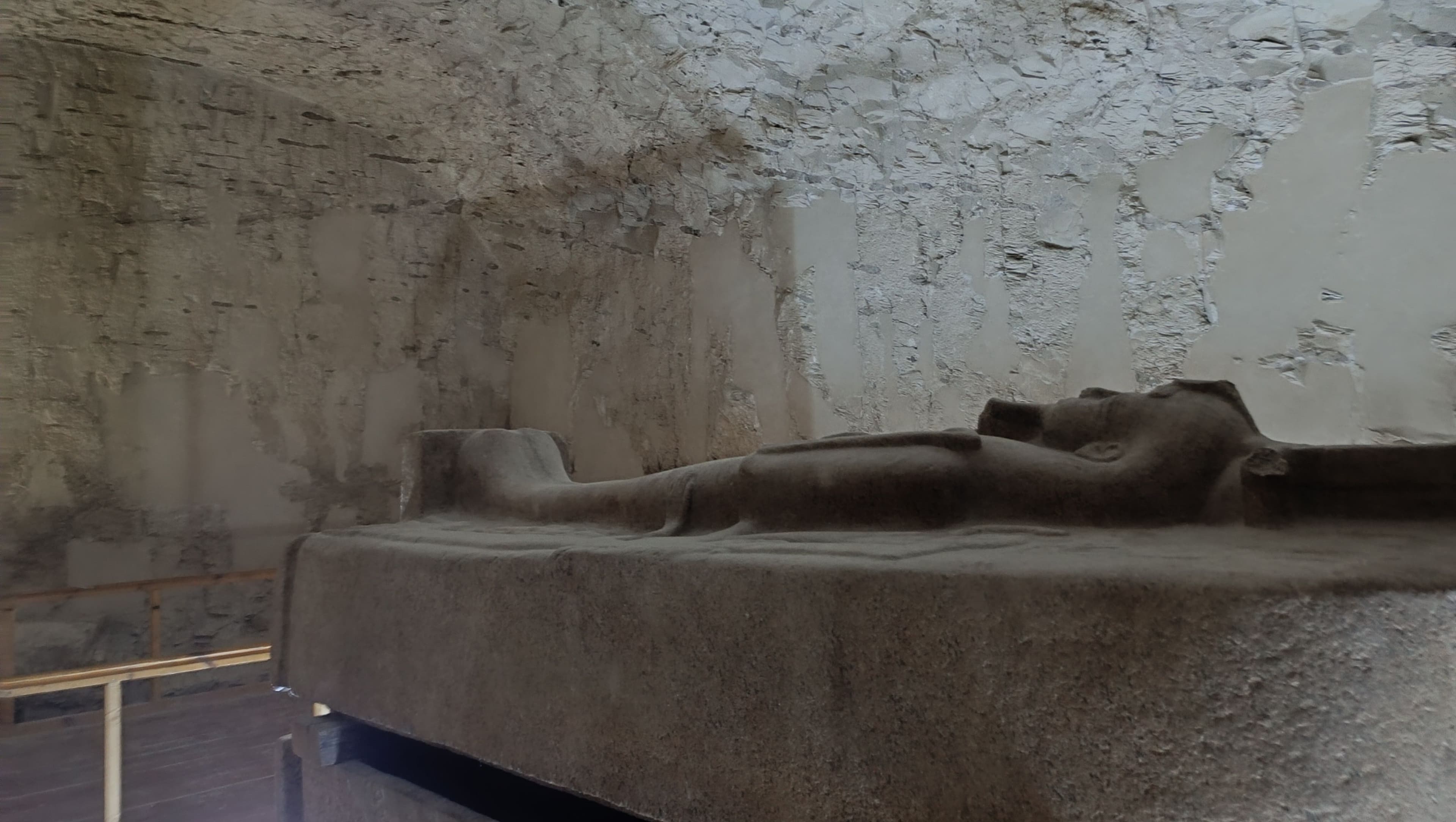 Painted tomb walls, colour still vivid.
